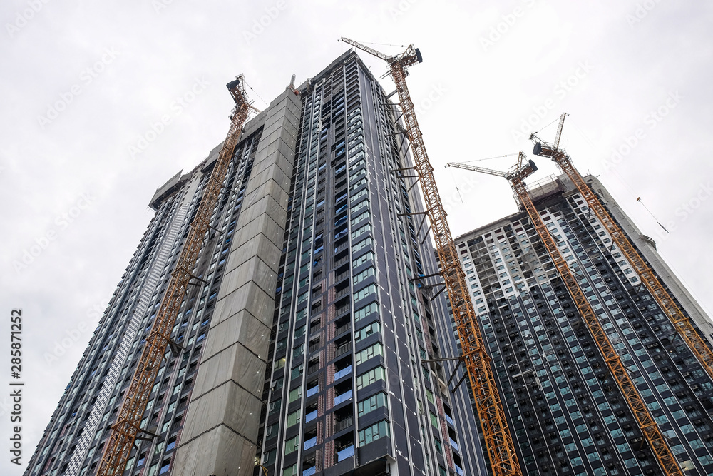 Fototapeta premium Construction site modern high rise condominium building