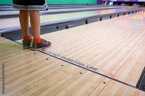 Bowling lane demarcation line being crossed