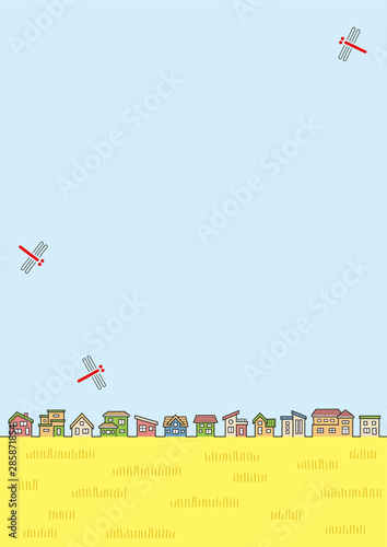 赤とんぼのいる秋の田舎の風景のイラスト(家の並びと空と田園)縦長の書式で横書き用