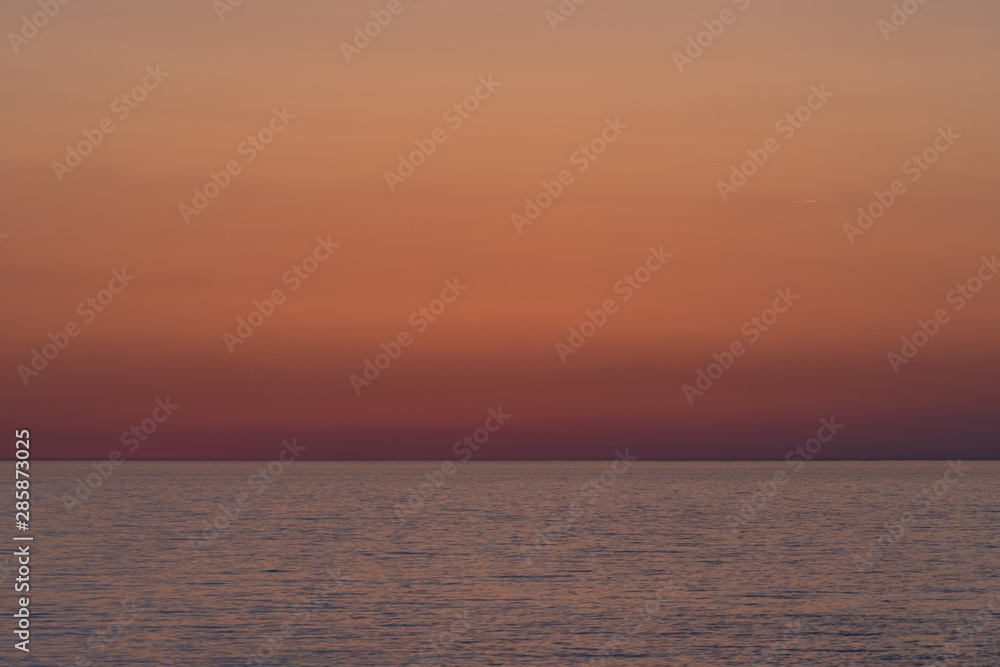 Sunset, sunrise over the sea. Maritime landscape.