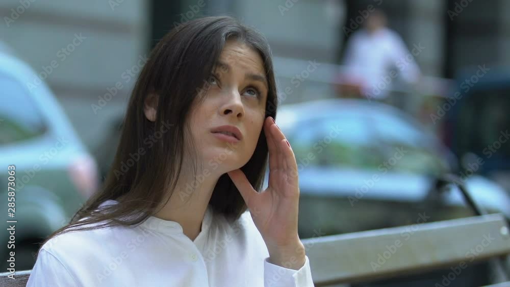 Sick female suffering weather related pain, low blood pressure, meteoropathy Sick female suffering weather related pain, low blood pressure, meteoropathy