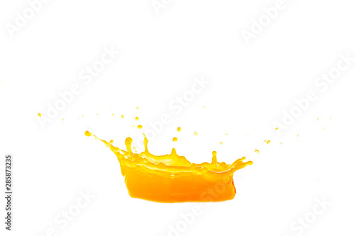 Fotografie Fresh orange juice splashes on a white background.