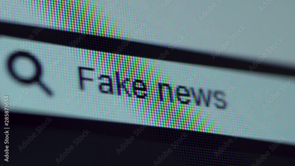 Browser bar with Fake News text typed on the computer screen. Shot in ...