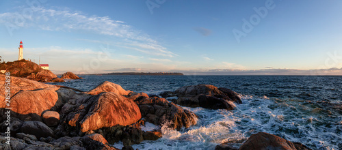 Beautiful Panoramic view of a rocky ocean coast during a vibrant sunny sunset. Taken in Lighthouse Park, Horseshoe Bay, West Vancouver, British Columbia, Canada.