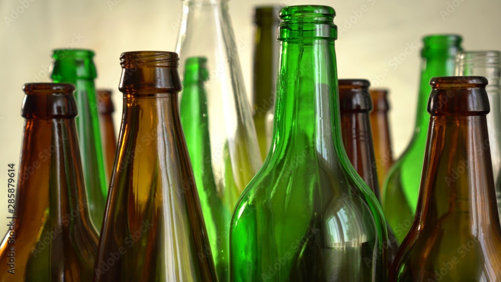 Empty used bottles and jars. Household waste. Glass products can be easily recycled and repurposed Empty used bottles and jars. Household waste. Glass products can be easily recycled and repurposed