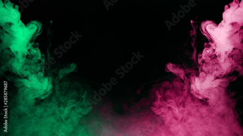 Abstract art colored smoke  on black isolated background