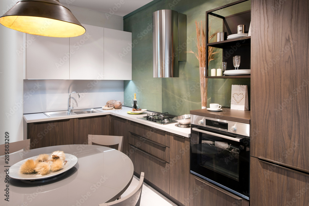 Interior of modern fitted kitchen with appliances Interior of modern fitted kitchen with appliances