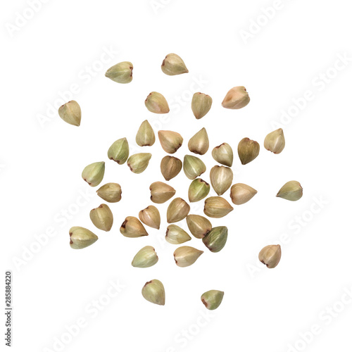 Spread out green buckwheat seen from above and isolated on white background