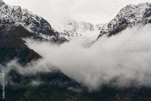 fog on the mountains in the winter at south island newzealand