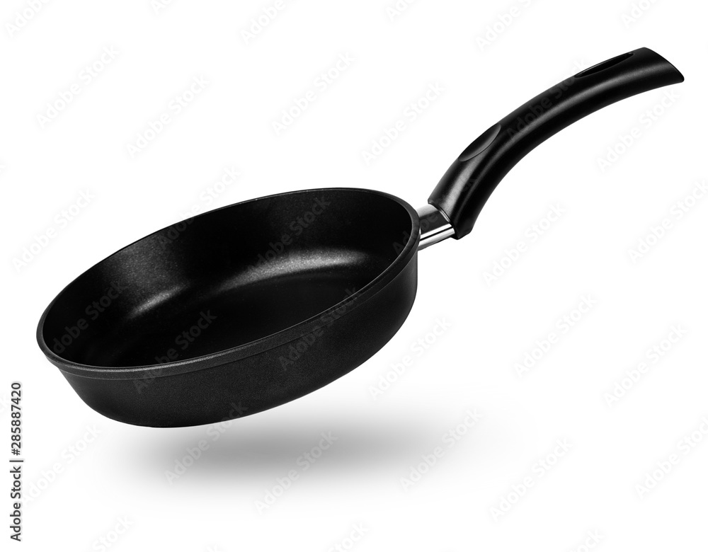 The black fry pan over white background The black fry pan over white background