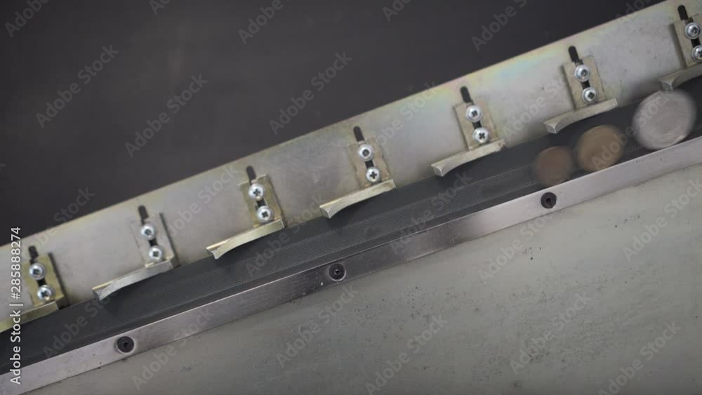 Coins from vending machine rolling inside coin sorting and counting machine. Close up. Coins from vending machine rolling inside coin sorting and counting machine. Close up.