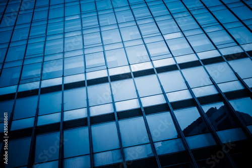 Urban abstract - windowed corner of office building.