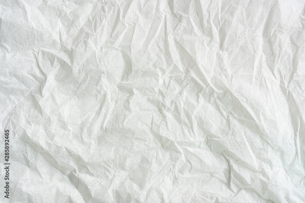 white color creased paper tissue background texture. white color creased paper tissue background texture.