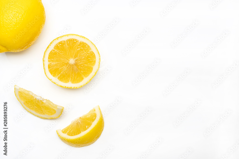 lemon and slices isolated on white background with copy space for text. lemon and slices isolated on white background with copy space for text.