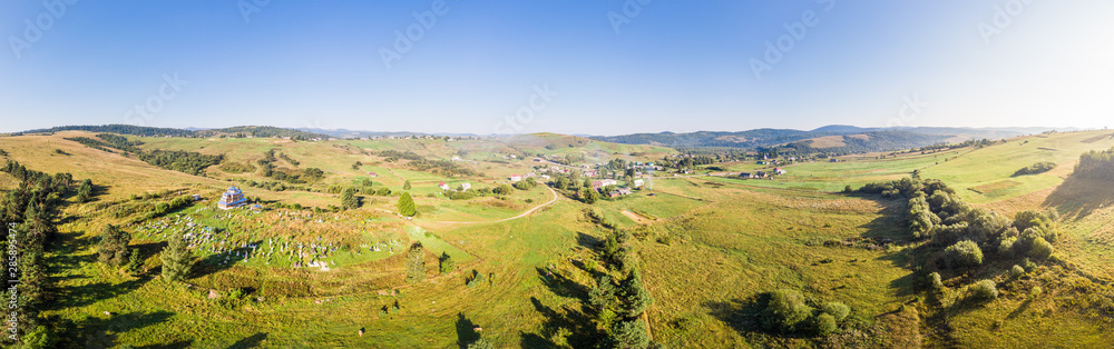 Panoramic landscape. Aerial drone view of Matkiv village in Carpathians, Ukraine