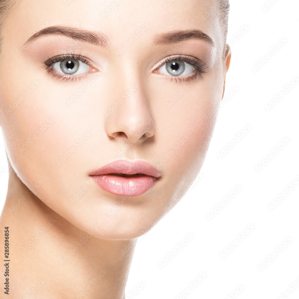 Beautiful face of young woman with healthy clean skin Beautiful face of young woman with healthy clean skin