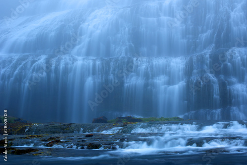 Long exposure photo of waterfall, view of the beautiful Dynjandi waterfall in Westfjords of Iceland, Europe.