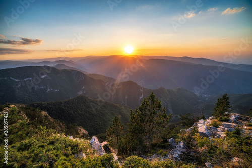 Summer sunset from The red wall reserve in Rhodope mountain, Bulgaria photo