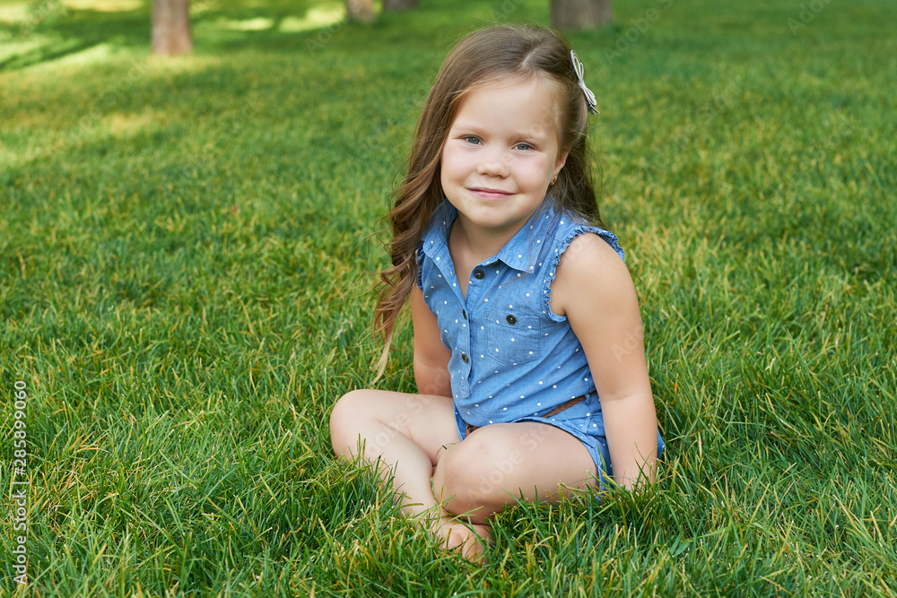 girl in the park on the grass