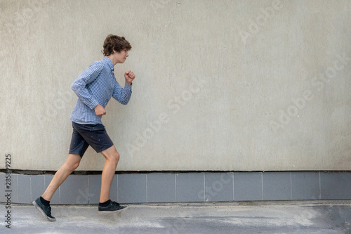 young man hurry up, running fast on the meeting