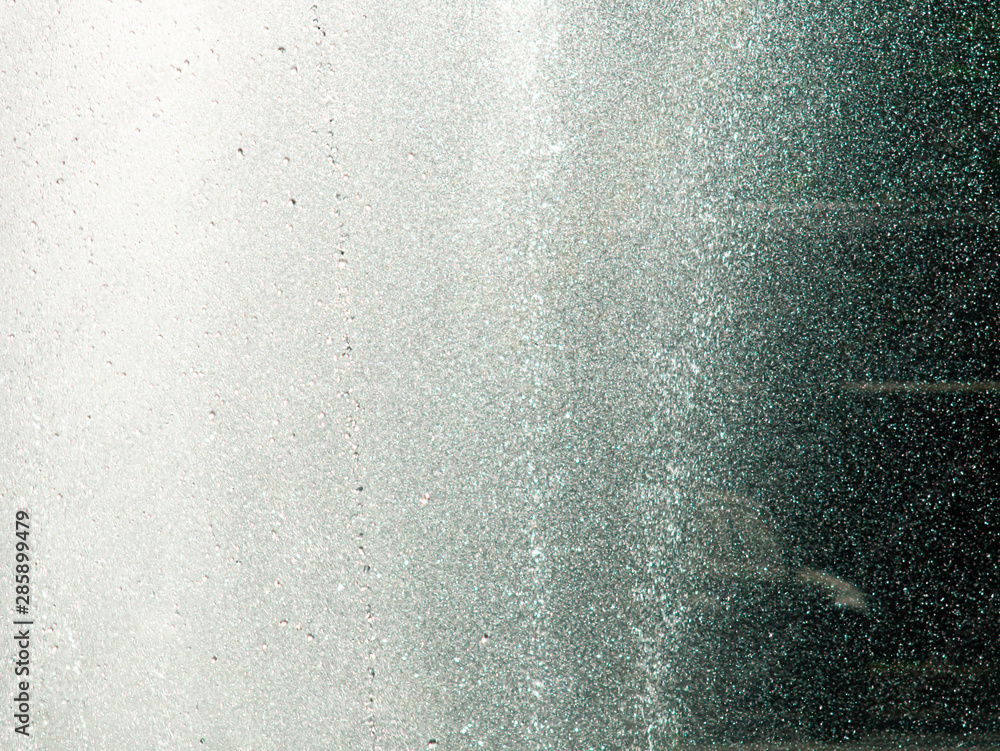 Spray and Water drops spraying from a fountain in the air. Spray and Water drops spraying from a fountain in the air.