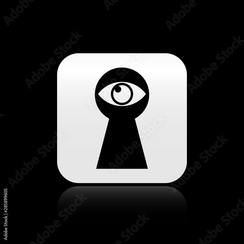 Black Keyhole with eye icon isolated on black background. The eye looks into the keyhole. Keyhole eye hole. Silver square button. Vector Illustration