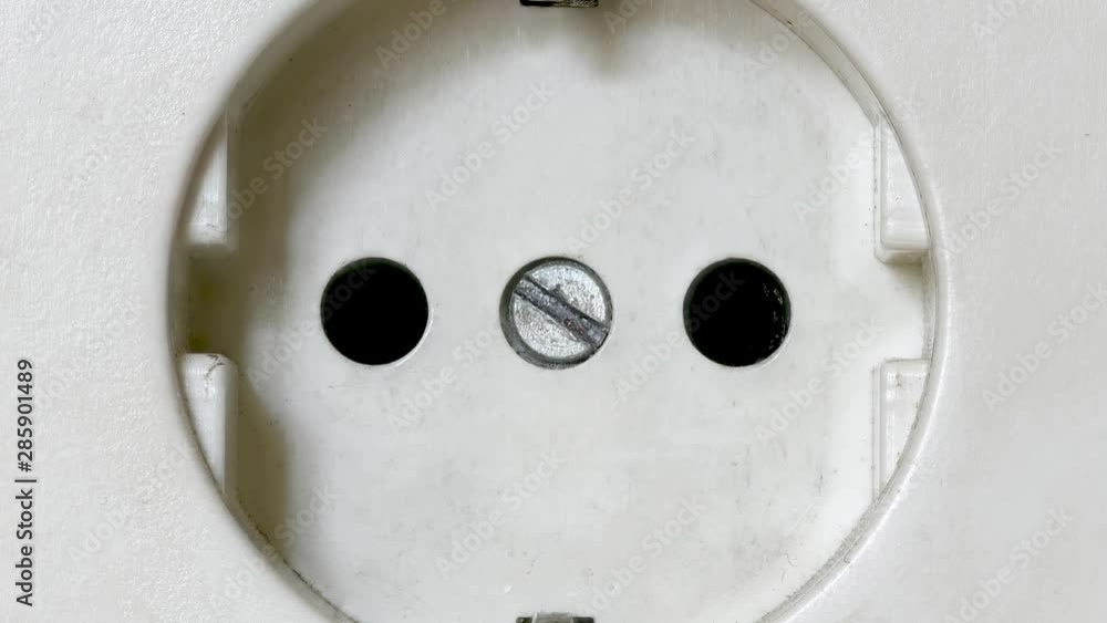 Electricity Concept: White Power Socket, Slow Zoom Out Electricity Concept: White Power Socket, Slow Zoom Out