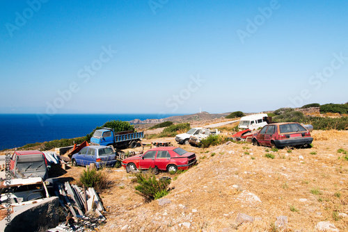 Wrecked and abandoned cars in the island of Patmos, Greece