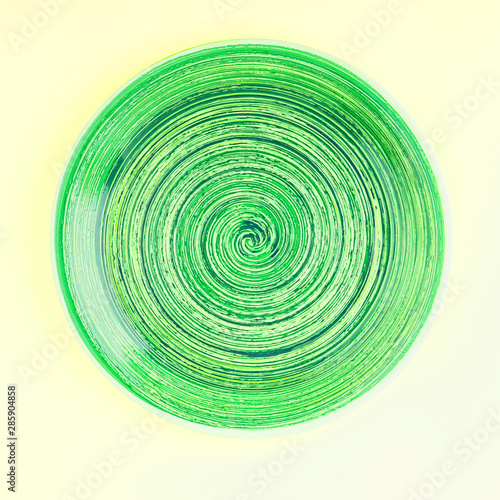 Green plate on the light beige background