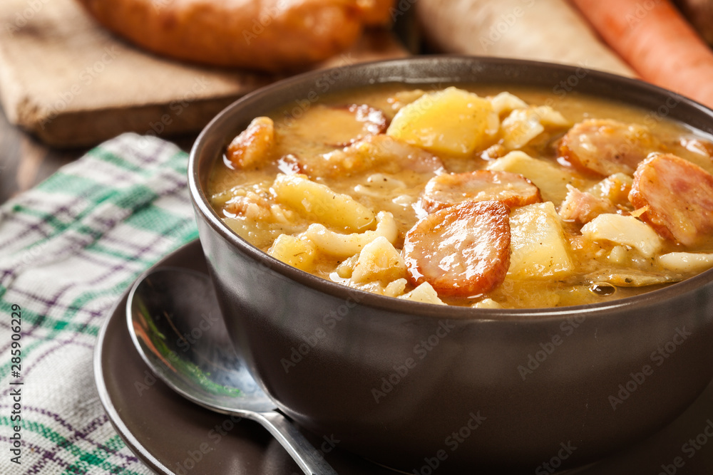 Traditional Polish split pea soup with sausage, bacon and potatoes Traditional Polish split pea soup with sausage, bacon and potatoes
