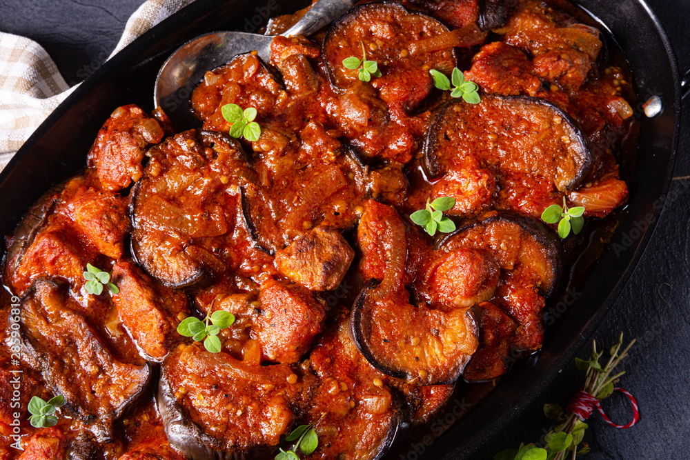 Fototapeta premium arni me melitzanes - stewed lamb with eggplant