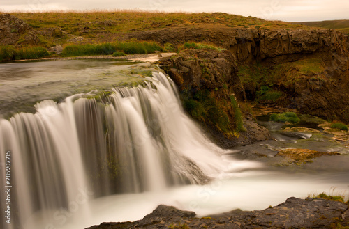 Long exposure photo of waterfall, view of the beautiful waterfall in nothern Iceland, Europe.