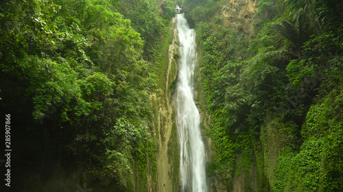 Mantayupan Falls in the jungle  island of Cebu  Philippines. Waterfall in the green forest.