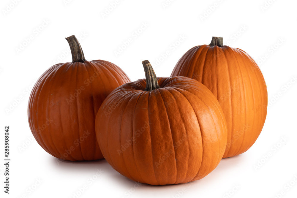 Three orange pumpkins