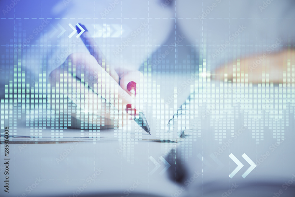Double exposure of woman's hands making notes with forex graph hologram. Concept stock market analysis. Double exposure of woman's hands making notes with forex graph hologram. Concept stock market analysis.
