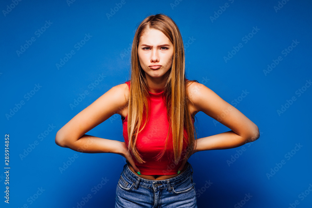 Young beautiful woman over isolated background celebrating crazy and amazed for success with arms raised and open eyes screaming excited. Young beautiful woman over isolated background celebrating crazy and amazed for success with arms raised and open eyes screaming excited.