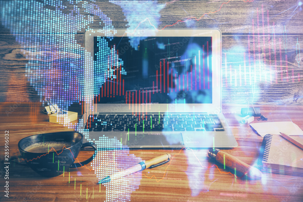 Double exposure of forex graph and work space with computer. Concept of international online trading. Double exposure of forex graph and work space with computer. Concept of international online trading.