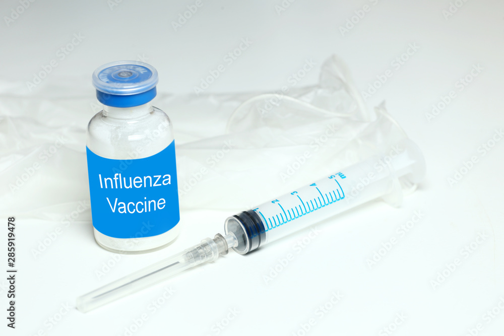 syringe and flu vaccine syringe and flu vaccine