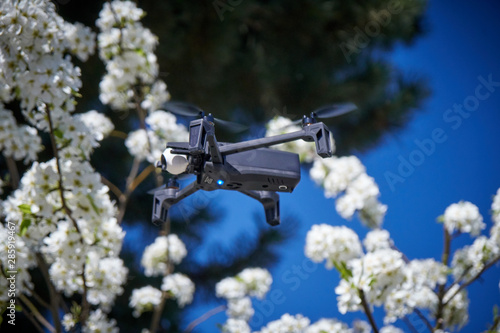 springtime in bavaria with a picture of a drone flying in the garden © Matthias