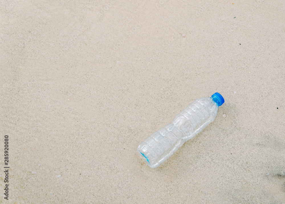 Plastic bottle garbage on the beach Human waste dumping Plastic bottle garbage on the beach Human waste dumping