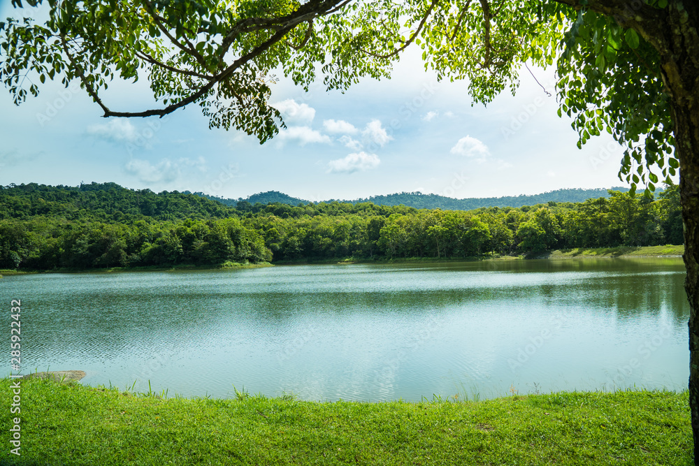 Landscape view of mountain and lake at sunrise or sunset. Landscape view of mountain and lake at sunrise or sunset.