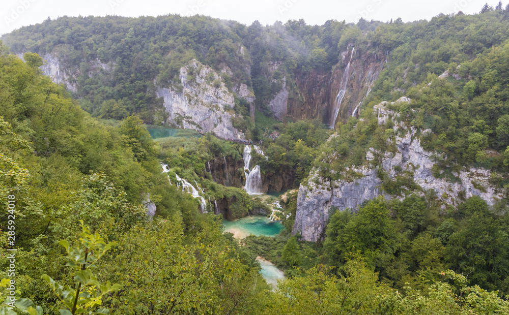 Plitvice lakes national park in Croatia view with the waterfalls and rocks - Image Plitvice lakes national park in Croatia view with the waterfalls and rocks - Image