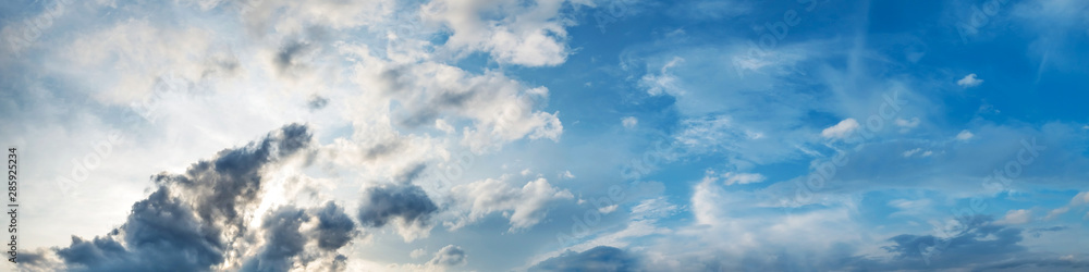 Dramatic panorama sky with storm cloud on a cloudy day. Panoramic image. Dramatic panorama sky with storm cloud on a cloudy day. Panoramic image.