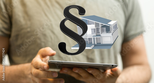 law house contract in hand