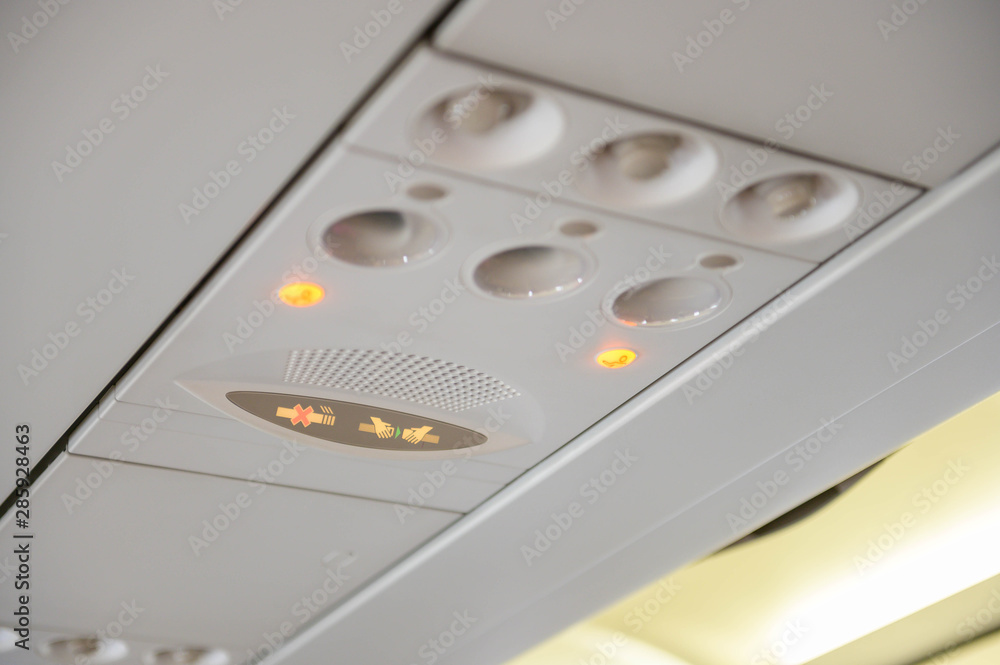 No Smoking and Fasten Seat belt Sign Inside an Airplane No Smoking and Fasten Seat belt Sign Inside an Airplane