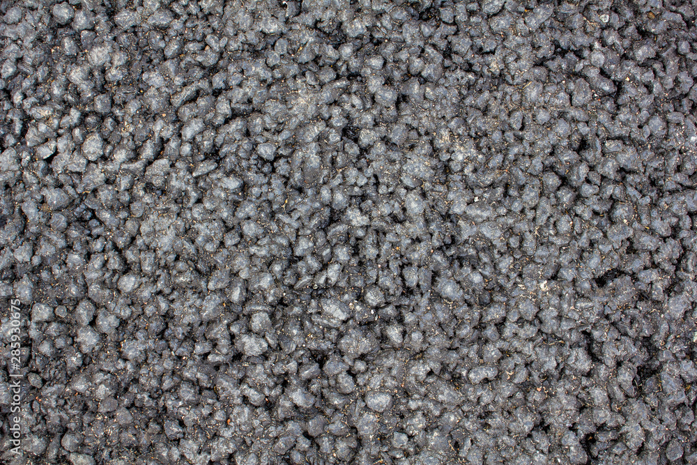 coarse gray asphalt closeup. rough surface texture coarse gray asphalt closeup. rough surface texture