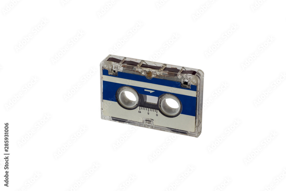 Obraz premium old vintage blue small tape cassette closeup isolated on white background