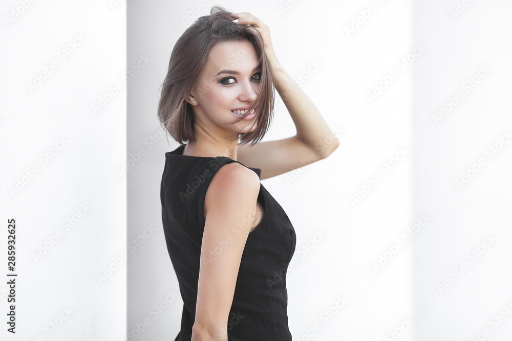 Beautiful elegant woman outdoors. Lady in black dress. Young female classic portrait. Beautiful elegant woman outdoors. Lady in black dress. Young female classic portrait.