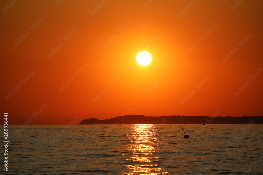 beautiful and romantic colorful sunrise early in the morning at the beach in north germany beautiful and romantic colorful sunrise early in the morning at the beach in north germany