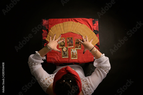 26 July 2019 Chiang mai, Thailand. Tarot cards woman reading predicting the future top view in the room